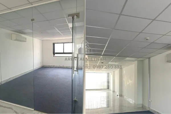 Không gian văn phòng cho thuê 25m2 quận 2 với trần nhà thạch cao, sàn lót thảm và sơn tường màu trắng.
